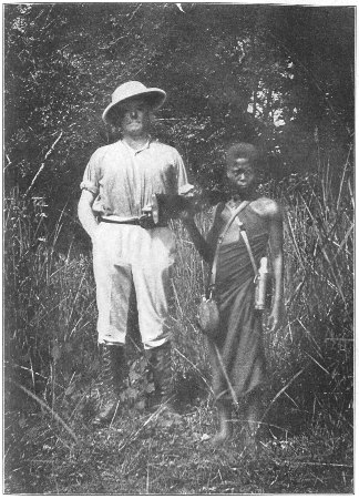 Mr. Davis and Native "Boy," on the Kasai River.