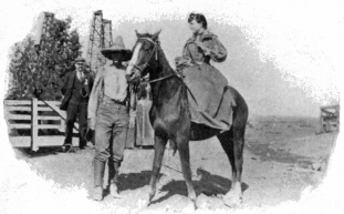 Image not available: MYRTLE TAYLOR ON A BRONCO.