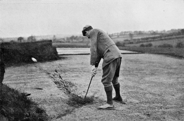 PLATE LIV. "WELL OUT!" FINISH OF AN ORDINARY STROKE IN
A BUNKER WHEN MUCH SAND IS TAKEN. THE BALL MAY BE SEEN RISING ABOVE THE
BUNKER