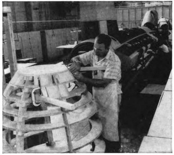 A man working on a large model